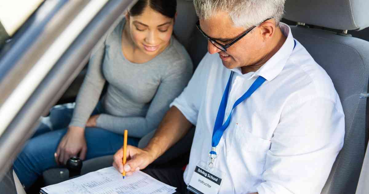 Woman taking driving course